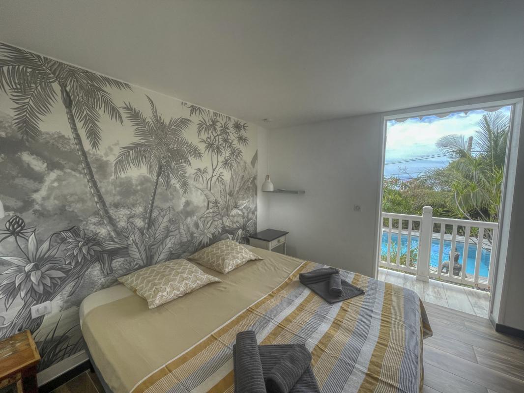 24.Location villa piscine vue mer Saint François  Guadeloupe_Chambre 1
